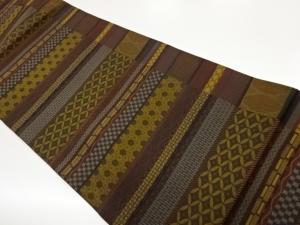 横段に古典柄模様織出し全通洒落袋帯